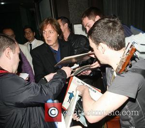 Paul McCartney is mobbed by autograph hunters as he leaves Cecconi's Restaurant London, England - 14.07.12