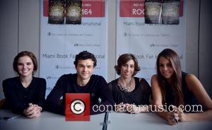 Actor Zoey Deutch, Alden Ehrenreich, Author Kami Garcia and Margaret Stohl  attend the signing of  'Beautiful Creatures' at...