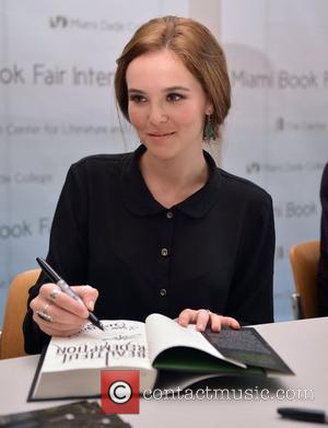 Zoey Deutch   attend the signing of 'Beautiful Creatures' at the 2012 Miami Book Fair International at Miami Dade...