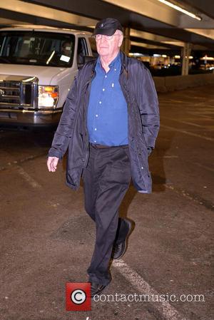 Sir Michael Caine Sir Michael Caine, his wife Shakira Caine and their family arrive at Miami International Airport  Featuring:...