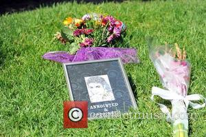 Fans visit Michael Jackson's tomb at Forest...