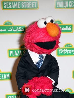 Elmo Jon Stewart with Elmo and The Sesame Street Muppets to host Sesame Workshop's 10th Annual Benefit Gala  New...