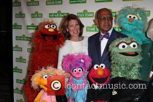 Sherrie Westin, Elmo, Melvin Ming, and the rest of Sesame Street Muppets Jon Stewart with Elmo and The Sesame Street...