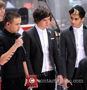 Liam Payne, Harry Styles, Zayn Malik One Direction performing live at 