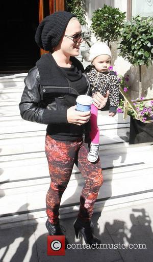 Pink, real name Alecia Moore leaves her hotel with daughter Willow Sage. London, England - 13.09.12