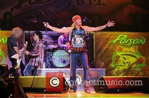 C.C. DeVille, Rikki Rockett, Bret Michaels and Bobby Dall  Poison performs during the Rock of Ages Tour 2012 at...