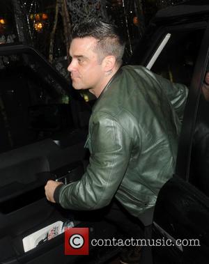 Robbie Williams arriving at his hotel  Featuring: Robbie Williams
Where: London, United Kingdom When: 26 Nov 2012