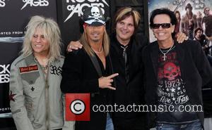 C.C. Deville, Bret Michaels, Rikki Rockett, and Bobby Dall of rock band Poison Premiere of Warner Bros. Pictures' Rock Of...