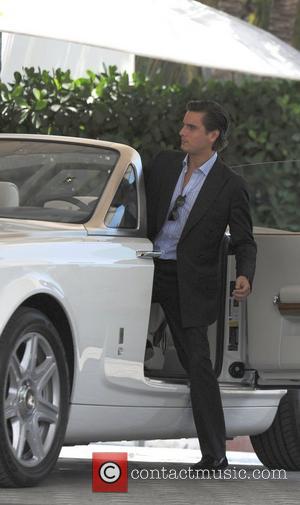 Scott Disick taking a ride in a Rolls Royce Phantom through Miami Beach Miami, Florida - 18.09.12