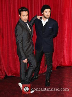 Robert Downey Jr. and Jude Law 'Sherlock Holmes: A Game of Shadows' premiere - Arrivals London, England - 08.12.11