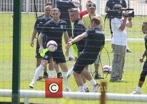 Robbie Williams and Teddy Sheringham Training for the Soccer Aid match which will be held in Manchester's Old Trafford stadium...