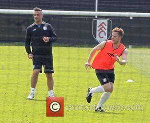 Robbie Williams and Olly Murs Celebrities training for the Soccer Aid match which will be held in Manchester's Old Trafford...