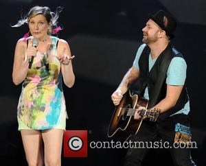 Jennifer Nettles and Kristian Bush of Sugarland  performing during the 'In Your Hands' Tour at the Cruzan Amphitheatre West...