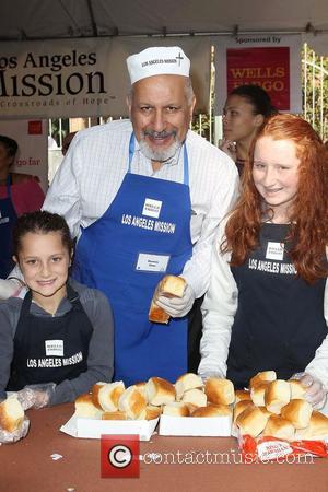 LA Council member Dennis P. Zine,  at the Los Angeles Mission's Thanksgiving for skid row homeless at the Los...