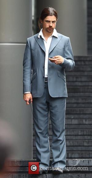 Brad Pitt's stunt double filming a scene of the movie 'The Counselor' on location in London. The story is about...