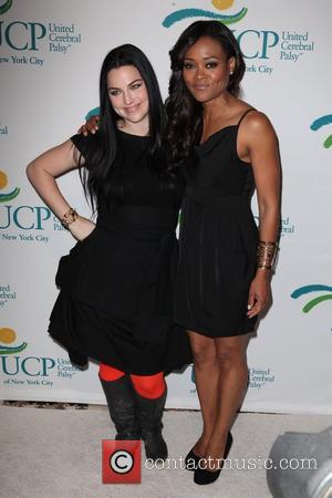 Singer Amy Lee and Robin Givens  11th Annual Women Who Care Luncheon Benefiting United Cerebral Palsy of New York...