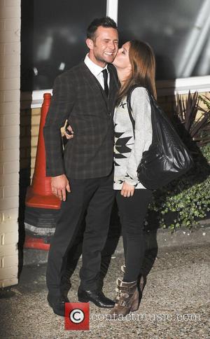 Harry Judd with Izzy Johnston,  at the X Factor held at Fountain Studios. London, England - 14.10.12