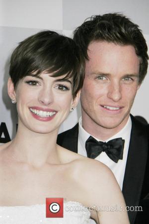 Anne Hathaway and Eddy Redmayne - NBC Universal's 70th Annual Golden Globe Awards After Party Los Angeles California United States...