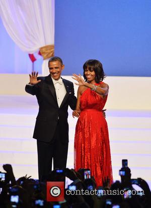 President Barack Obama - President Barack Obama and first lady Michelle...