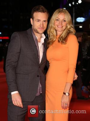 Rafe Spall and Elize Du Toit