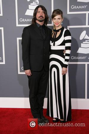 Dave Grohl and Jordyn - 55th Annual GRAMMY Awards Los Angeles California United States Sunday 10th February 2013