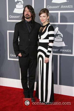 Dave Grohl and Jordyn - 55th Annual GRAMMY Awards Los Angeles California United States Sunday 10th February 2013