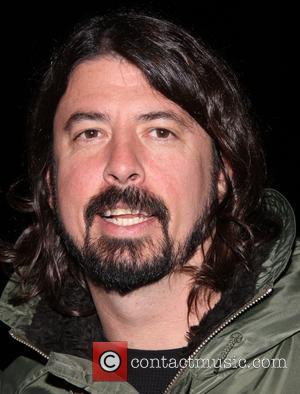 Dave Grohl - Dave Grohl takes his daughters to the Broadway musical 'Annie' at the Palace Theatre at Palace Theatre...