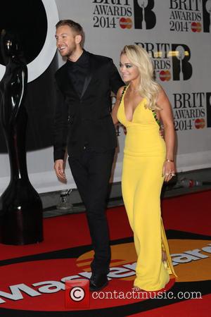 Calvin Harris and Rita Ora - The Brit Awards (Brit's) 2014 held at the O2 - Arrivals - London, United...