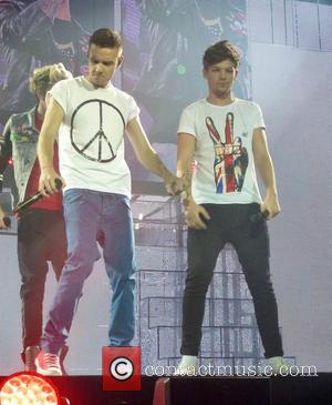 Niall Horan, Liam Payne, Lois Tomlinson and One Direction - One Direction perform at London's O2 Arena - London, United...