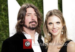 Dave Grohl and Jordyn Blum Grohl - 2013 Vanity Fair Oscar Party at Sunset Tower - Arrivals - Los Angeles,...