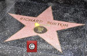 Richard Burton and Elizabeth Taylor Snuggle Up Together On The Hollywood Walk of Fame