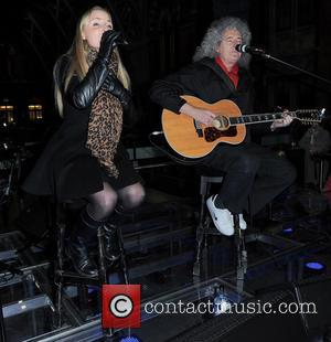 Kerry Ellis and Brian May - Artists perform at St. Pancras Station to raise awareness for the 'Born Free Foundation'...