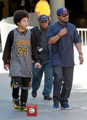 Ice Cube and Shareef Jackson - Celebrities arrive at the Staples Center to watch the Los Angeles Lakers vs. Chicago...