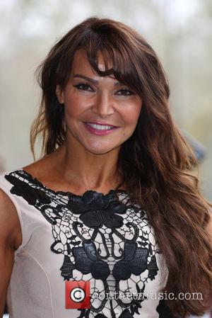 Lizzie Cundy - The Tric Awards 2014 held at the Grosvenor House Hotel - Arrivals - London, United Kingdom -...