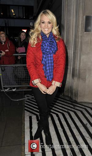 Carrie Underwood - Carrie Underwood arriving at the BBC Radio 2 studios - London, United Kingdom - Wednesday 13th March...