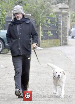 George Michael - George Michael spotted out walking his dog with his friends in London - London, United Kingdom -...