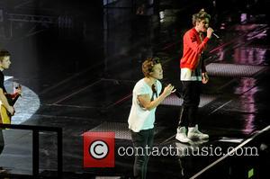 One Direction, Niall Horan and Harry Styles - One Direction performing in concert at the LG Arena - Birmingham, United...