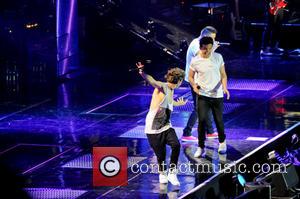 One Direction, Niall Horan, Liam Payne and Louis Tomlinson - One Direction performing in concert at the LG Arena -...