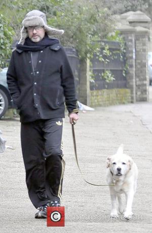 George Michael - George Michael spotted out walking his dog with his friends in London - London, United Kingdom -...