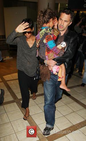 Halle Berry - Halle Berry arrives at LAX airport with...