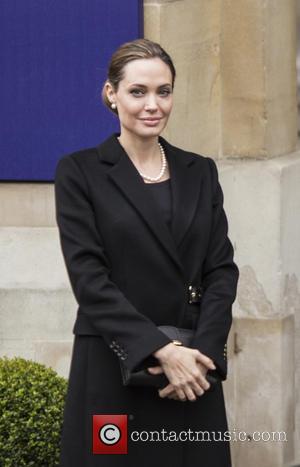 Angelina Jolie - Angelina Jolie and William Hague arrive at...