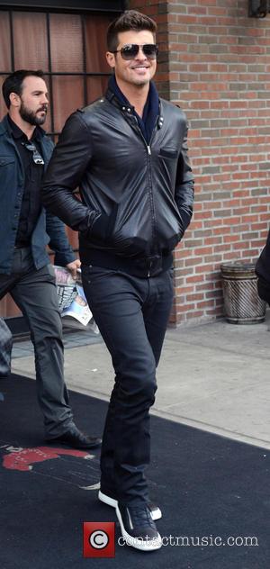 Robin Thicke - Celebrities outside their New York hotel