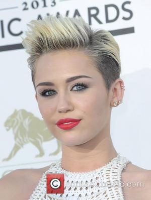 Miley Cyrus - 2013 Billboard Music Awards at the MGM...