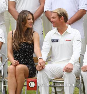 Elizabeth Hurley and Shane Warne - Elizabeth Hurley and Shane Warne host a cricket match between an Australian 11 and...