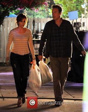 Jennifer Lopez and John Corbett