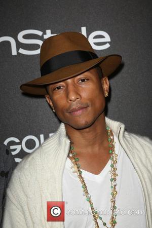 Pharrell Reclaims The UK No. 1 Spot From Pitbull & Ke$ha