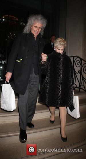 Brian May and Anita Dobson - Animal Hero Awards at the Langham Hotel - Departures - London, United Kingdom -...