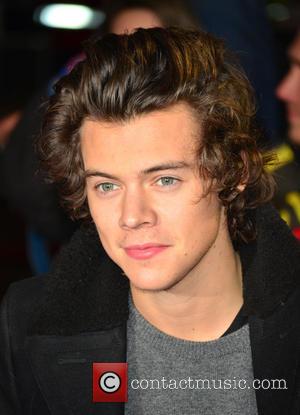 HARRY STYLES - DAVID BECKHAM AND HARRY STYLES ATTENDS THE...