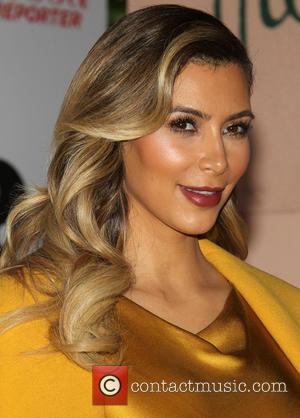 Kim Kardashian - The Hollywood Reporter's Women In Entertainment Breakfast...