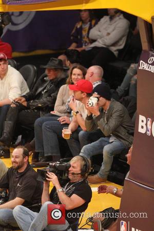 Zac Efron - Friday December 20, 2013; Celebs out at the Lakers game. The Los Angeles Lakers defeated the Minnesota...